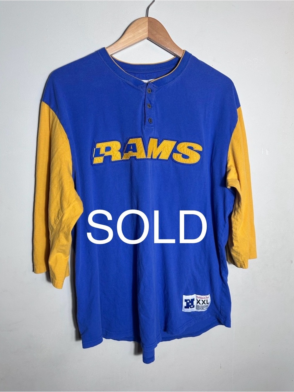 SOLD Mitchell & Ness Blue and Yellow Rams Henley Jersey Vintage-Style